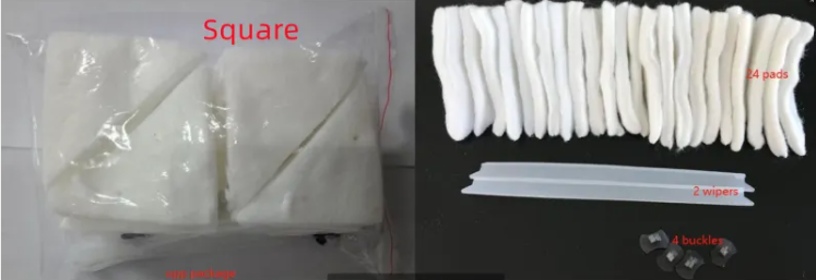 Packaged white square items with clear plastic packaging, showing a close-up of the packaging and items.